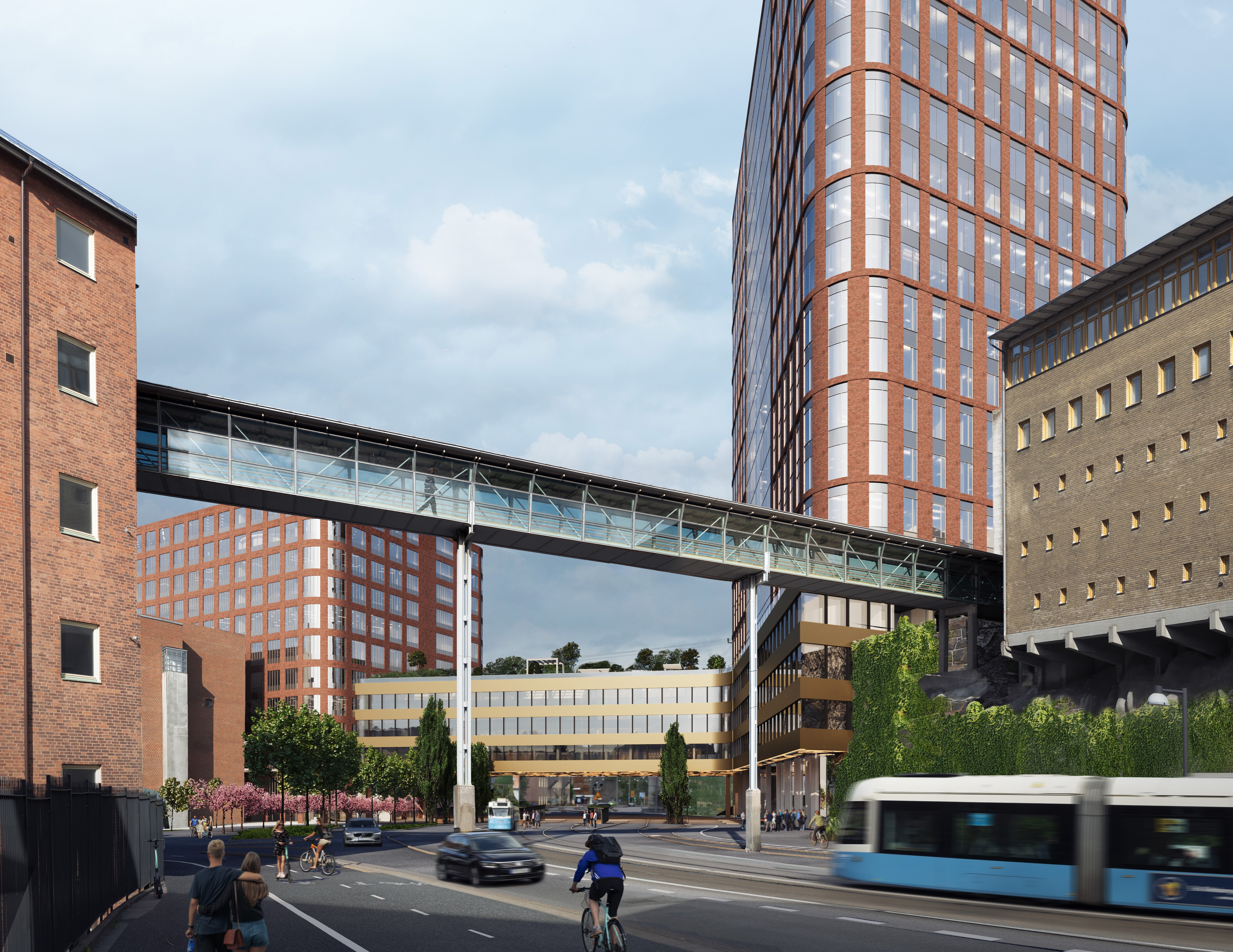 Sjukhusbyggnader, cyklist och spårvagn