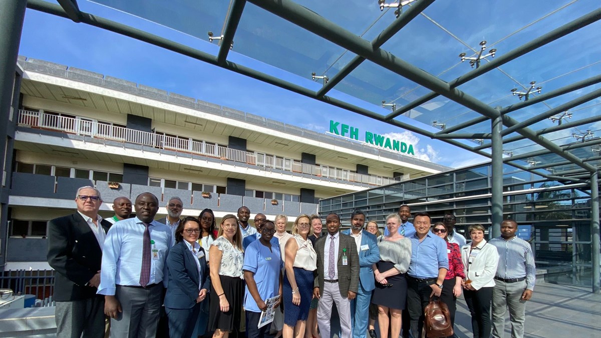 Delegation standing in front of hospital building in Kigali, Rwanda