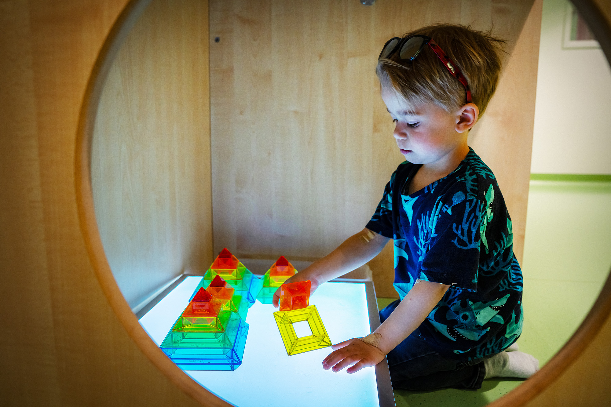 A child playing with cubes.