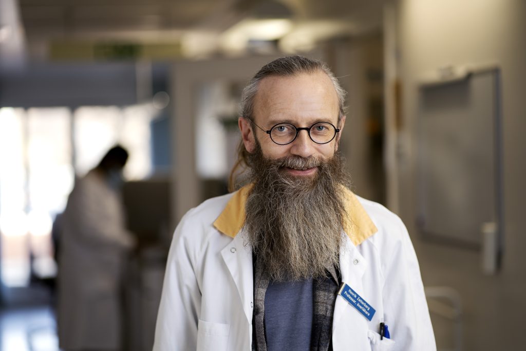 Male medical professional in white coat 