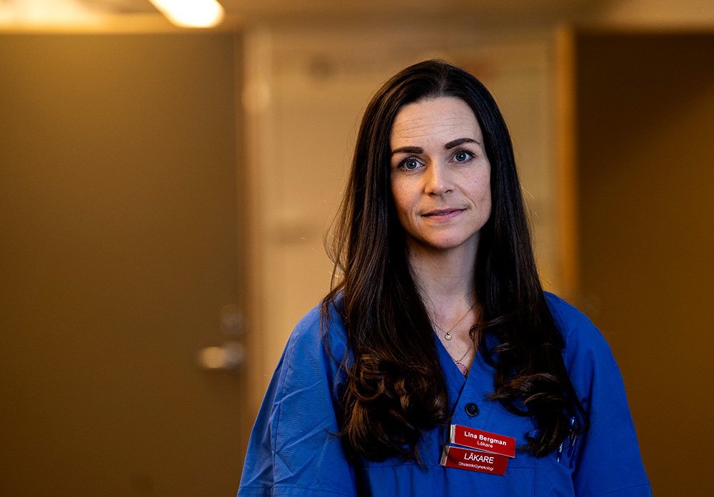 A doctor smiling at the camera.